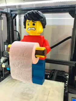 Scared face lego man toilet roll holder