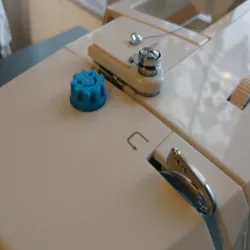 Sewing maching easy foot tension knob