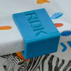 Simple table cloth holder