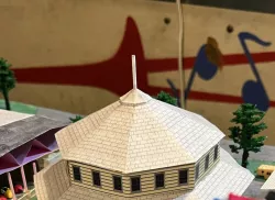 Flagpole for carousel building