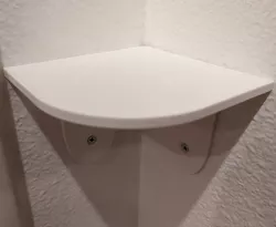 Rounded small corner shelf