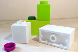 Stackable lego-like box using pop bottle caps