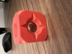 A coin stuck in a cube