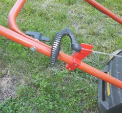 Holder for starting rope. Lawn mower.