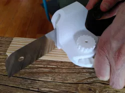 Multi-function woodworking tool (saw guide, ruler, square)