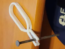 Self-gripping nail holder