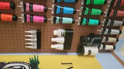 Peg board bottle hoders
