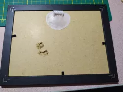 Picture frame hanger to stick