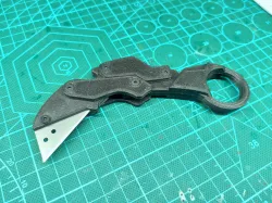 Folding Karambit with utility blade