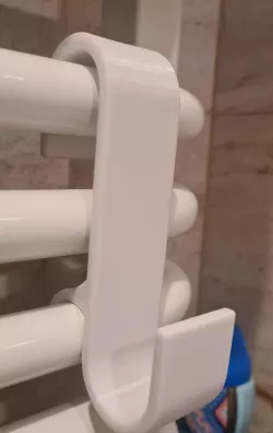 Hanger for a bathroom radiator
