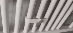 Bathroom radiator towel hanger