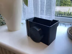 Camera flower pot with water indicator