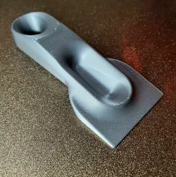 Aerodynamic bed scraper