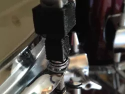 Drum key drill attachment.