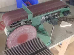 Belt sander idle roller