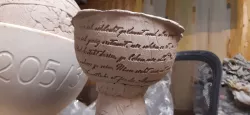 Claystamp with philosophic cites