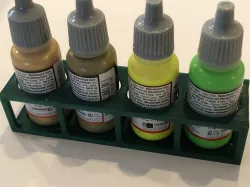 Miniature paint bottle holder