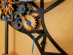Remixed reel "gear" cover for mechanical wall clock