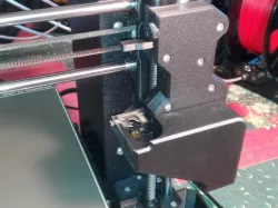 X AXIS WITH BLEEDING MECHANISM AND BELT TENSIONER