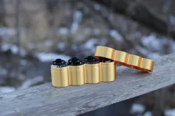 35mm film case- (holds 4 rolls)