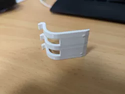 Lock hook for paper towel dispenser