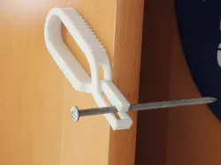 Self-gripping nail holder - larger version