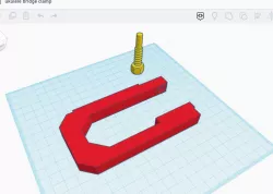 Ukulele bridge clamp