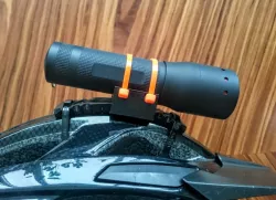Universal flashlight helmet mount