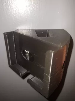 Wall mounted phone holder