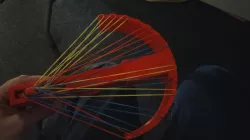 Bow attachment for rubber band gun