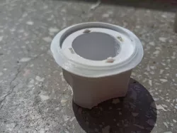 Nespresso capsule opener with integrated blades