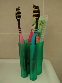 Vase mode toothbrush & toothpaste cup