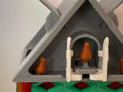 A WALL CLOCK WITH HIDDEN DOORS AND A BIRD COMING OUT
