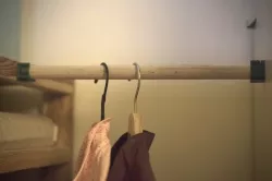 Holders for Broomstick as a Pole for Clothes Hangers