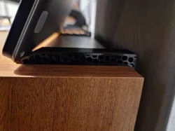 Laptop hook for near wall vertical storage