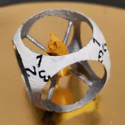 figurine in a dice