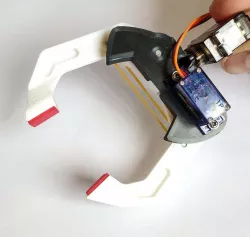 Robotic Gripper / Clamp. Two Degrees of freedom.  Servo controlled
