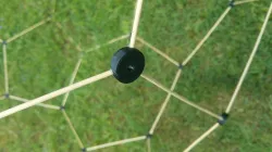 Truncated Icosahedron holding necklace stones with BBQ Stick