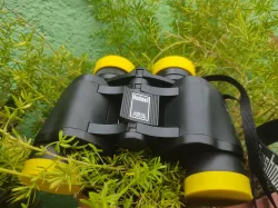 Lens cover for binoculars