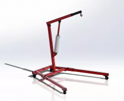 Crane lifts engines with telescopic beam and hydraulic cylinder.