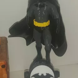 BATMAN FIGURE WITH BAT SIGNAL