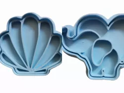 Elephant in a heart cookie cutter and a Shell cookie cutter