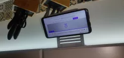 Smartphone holder for kitchen cabinet
