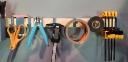 Modular shelf brackets for 1x2 boards - command strip mounted