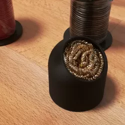 Holder for brass sponge