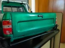 pickup truck tailgate stepped filler panel with handle