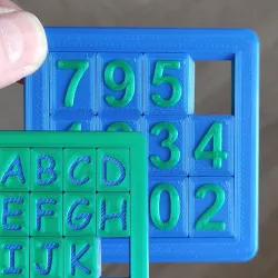 Double-sided sliding puzzle