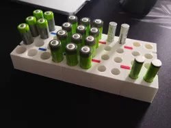 Modular support for AA and AAA batteries