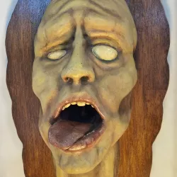 Mummified moaning head