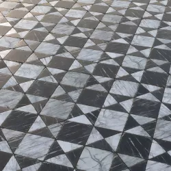 Aged black and white marble tiles Texture